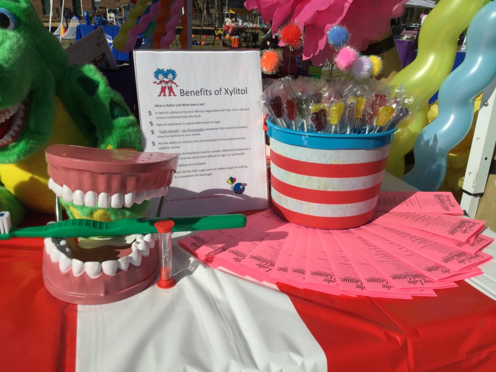 Partners in Education table with goodies and model of teeth