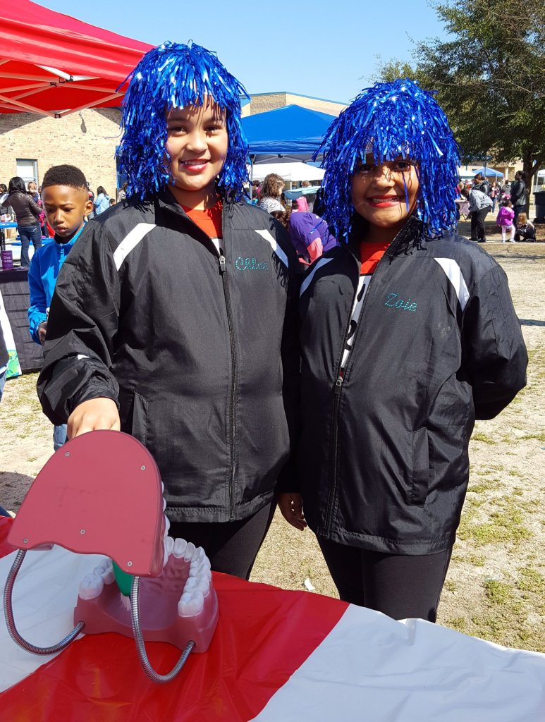 Partners in Education event, 2 middle aged women