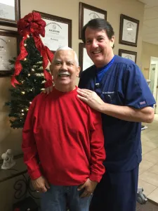 Doctor smiling with patient