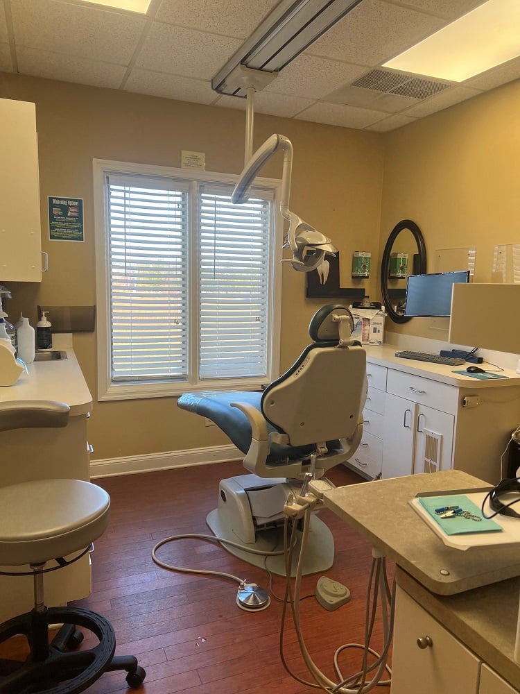 Dental chair in patient room.